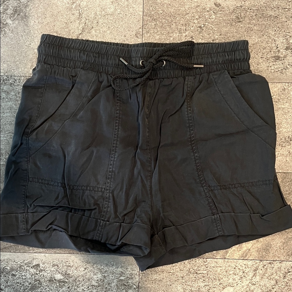Dark gray cargo shorts with drawstring tie